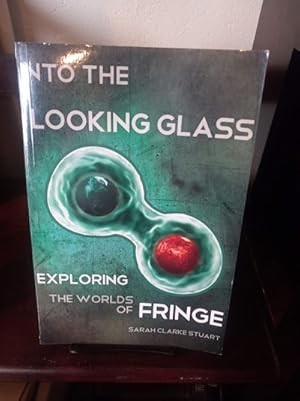 Immagine del venditore per Into the Looking Glass: Exploring the Worlds of Fringe venduto da Stone Soup Books Inc