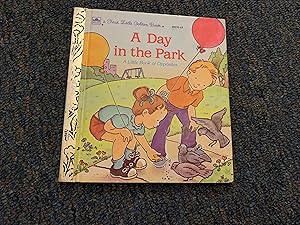 Bild des Verkufers fr A Day in the Park (First Little Golden Books) zum Verkauf von Betty Mittendorf /Tiffany Power BKSLINEN