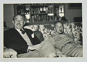 Image du vendeur pour ORIGINAL CANDID PHOTOGRAPH OF MOVIE MOGULS JACK L. WARNER AND DARRYL F. ZANUCK. Circa 1955 mis en vente par Hardy Books