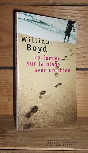 Image du vendeur pour LA FEMME SUR UNE PLAGE AVEC UN CHIEN mis en vente par Planet's books