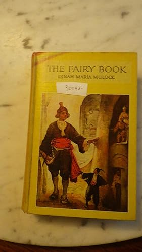 Immagine del venditore per THE FAIRY BOOK BY DINAH MARIA MULOCK, , Illustrated by LOUIS RHEAD & FRANK E. SCHOONOVER ,1922, RAINBOW BLUE RIBBON BOOKS NY, HARDBACK CVR SHOWS MAN WITH RED SASH AT HIS WAIST & HAT & HIS HAND TOUCHES THE WALL & LITTLE TINY ME venduto da Bluff Park Rare Books