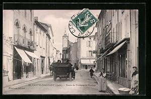 Carte postale Castelnaudary, Route de Roulouse et Horloge