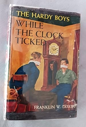 Seller image for While the Clock Ticked (Hardy Boys Mystery Stories) for sale by Gargoyle Books, IOBA