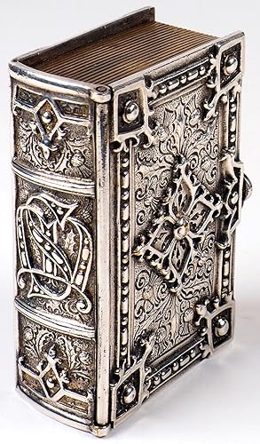 [Trinket box in the form of a miniature book.
