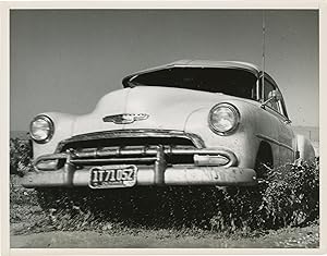 Archive of fifteen original photographs of automobile tire testing by the US Rubber Company, circ...