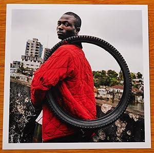 ESTATE STAMPED - TIM HETHERINGTON BOY WITH A FIRESTONE TIRE - LTD 6" x 6" MAGNUM ARCHIVAL PRINT