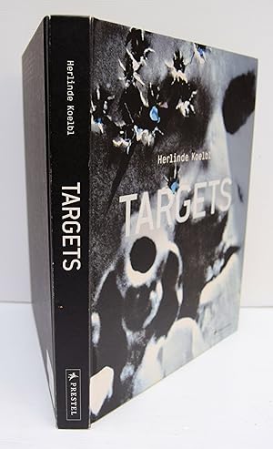 Imagen del vendedor de TARGET Over a period of six years photographer Herlinde Koelbl visited military training camps in almost 30 countries worldwide, to witness soldiers learning their deadly trade. The result, accomponied by isightful texts from Gerry Adams and Arkandy Babchenko, is a fasinating compilation of over 200 images of the diverse targets used in practice to simulate the enemy and prepare for real life combat. Koelbl documented soldiers training in vast empty deserts, surrealistic underground bunkers, abandoned cottages in the German countryside, and mock cities constructed by Hollywood set designers. Accompanied by commentary by the soldiers themselves, these images illustrate the incredibly diverse and increasingly perplexing conditions confronted a la venta por Marrins Bookshop