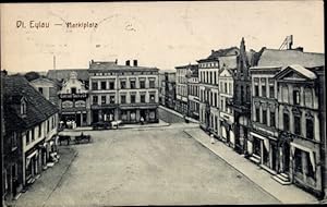 Ansichtskarte / Postkarte Deutsch Eylau Westpreußen, Marktplatz, Handlung - Inh. Conrad Tach und Co.