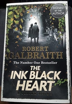 Seller image for SALE! The Ink Black Heart:: Cormoran Strike 6 - Signed and Hologrammed (1st Edition . First Print thus) for sale by First.Editions1st