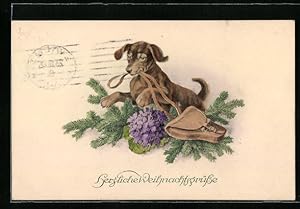 Bild des Verkufers fr Knstler-Ansichtskarte M. Munk Nr. 1109: Hund schnappt sich das Lederband der Tasche, Herzliche Weihnachtsgrsse! zum Verkauf von Bartko-Reher