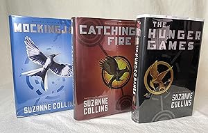 Bild des Verkufers fr The Hunger Games Trilogy; The Hunger Games, Catching Fire, Mockingjay, (ALL SIGNED), 2nd/1st/1st. Bonus: The Ballad of Songbirds and Snakes zum Verkauf von Aesthete's Eye Books