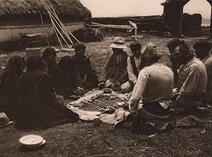 A feasting of Aymara Indians at Tilata on Lake Titicaca. Their meal consist mainly of potatoes, s...