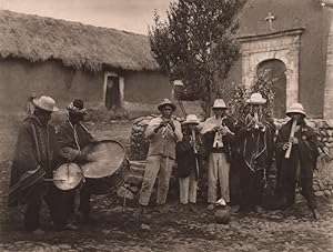 Aymara musicians at a feast, on the shores of Lake Titicaca. Strange are the tunes of their melod...