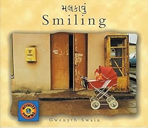 Bild des Verkufers fr Smiling (Small World) Gujarati and English edition zum Verkauf von WeBuyBooks