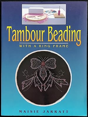 Tambour beading with a ring frame.