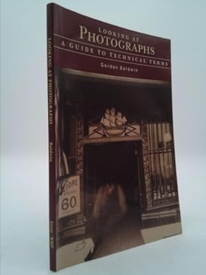 Bild des Verkufers fr Looking at Photographs: A Guide to Technical Terms, Revised Edition zum Verkauf von ThriftBooksVintage
