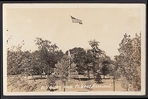 Bild des Verkufers fr Old Glory American Flag over Fort Benjamin Harrison IN RPPC postcard 1942 zum Verkauf von The Jumping Frog