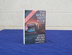 Image du vendeur pour The House Next Door (SIGNED). mis en vente par Centerbridge Books