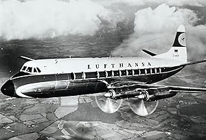 1960s Glossy Black and White Photo of a Lufthansa Vickers V-814 Vicount Jetliner In Flight