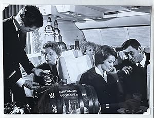 1960s Glossy Black and White Photo of Lufthansa Passengers Enjoying Wine and Beer en Route