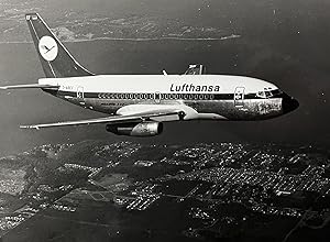 1970s Glossy Black and White Photo of a Lufthansa Boeing 737 "City Jet" In Flight