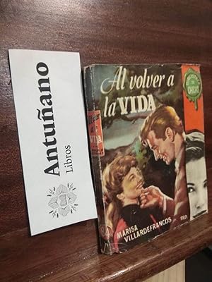 Imagen del vendedor de Al volver a la vida a la venta por Libros Antuano