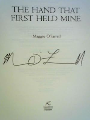 Seller image for The Hand That First Held Mine for sale by World of Rare Books