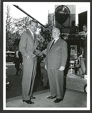 Imagen del vendedor de NORTH BY NORTHWEST (Original Candid 1959 Double Weight Photograph of Cary Grant and Alfred Hitchcock) a la venta por Lakin & Marley Rare Books ABAA