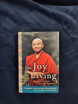 Imagen del vendedor de THE JOY OF LIVING: UNLOCKING THE SECRET & SCIENCE OF HAPPINESS a la venta por JB's Book Vault