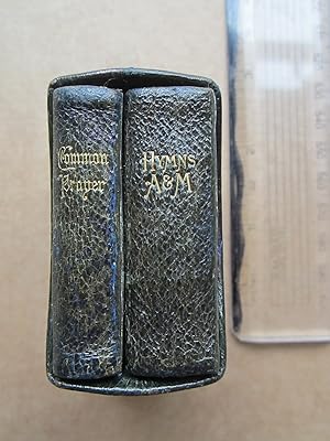 Seller image for The Book of Common Prayer, and Administration of the Holy Communion, According to the use of the Church of England , Hymns Ancient and Modern for use in the Services of the Church. Complete Edition [Two Miniature Books in Silversmith Bindings] for sale by K Books Ltd ABA ILAB