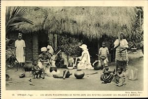 Ansichtskarte / Postkarte Togo, Les Soeurs Missionaires de Notre Dame Des Apotres Soignant des Ma...