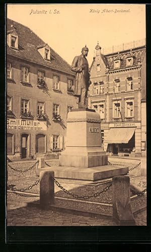 Bild des Verkufers fr Ansichtskarte Pulsnitz i. Sa., Schneiderei von Emil Mller und Knig Albert-Denkmal zum Verkauf von Bartko-Reher