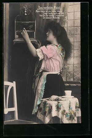 Imagen del vendedor de Foto-Ansichtskarte GL Co: Junge Frau betrachtet den Singvogel im Kfig a la venta por Bartko-Reher
