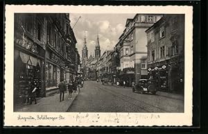 Ansichtskarte Liegnitz, Goldberger Strasse mit Geschäften und Kirche