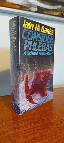 Image du vendeur pour Consider Phlebas', UK signed and inscribed first edition in great condition with unfaded dust jacket mis en vente par First and Fine