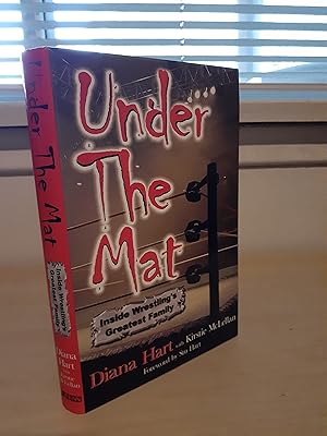 Image du vendeur pour Under the Mat: Inside Wrestling's Greatest Family mis en vente par Frabjous Books