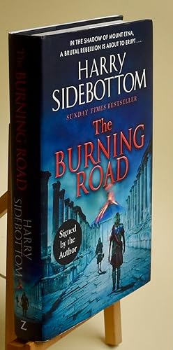 Seller image for The Burning Road. First Printing. Signed by the Author for sale by Libris Books