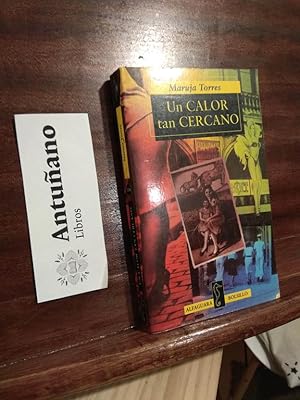 Seller image for Un calor tan cercano for sale by Libros Antuano