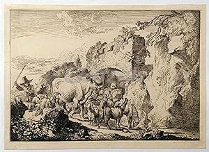 Boy shepherd with his flock near a ruin