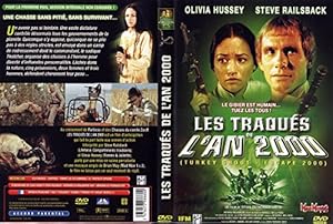 Seller image for Les Traqus de l'an 2000 for sale by Dmons et Merveilles