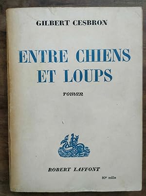 Image du vendeur pour Entre chiens et loups Robert laffont mis en vente par Dmons et Merveilles