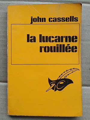 Bild des Verkufers fr La lucarne rouille masque zum Verkauf von Dmons et Merveilles