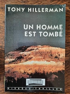 Seller image for Un Homme est Tomb for sale by Dmons et Merveilles