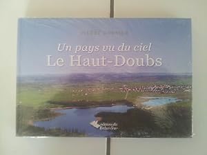 Seller image for Pierre DORNIER un pays vu du ciel LE HAUT DOUBS neuf encore emball for sale by Dmons et Merveilles