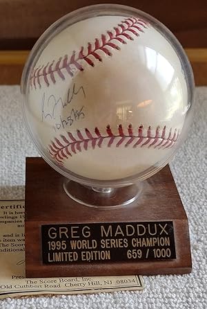 Official Rawlings 1995 World Series Baseball Signed by Greg Maddux [Includes COA and stand]