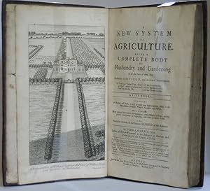 Bild des Verkufers fr A new system of agriculture. Being a complete body of husbandry and gardening in all the parts of them. Viz. Husbandry in the field, and its several improvements. Of forest and timber trees, great and small; with ever-greens and flow?ring shrubs, &c. Of the fruit-garden. Of the kitchen-garden. Of the flower-garden. In five books. Containing all the best and latest, as well as many new improvements, useful to the husbandman, grazier, planter, gardener and florist. Wherein are interspersed many curious observations on vegetation; on the diseases of trees, and the general annoyances to vegetables, and their probable cures. As also a particular account of the famous silphium of the antients. zum Verkauf von Roger J Treglown,  ABA.