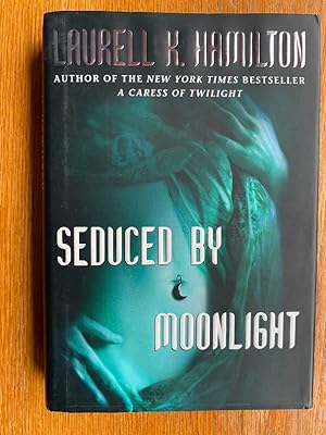 Seller image for Seduced By Moonlight for sale by Scene of the Crime, ABAC, IOBA