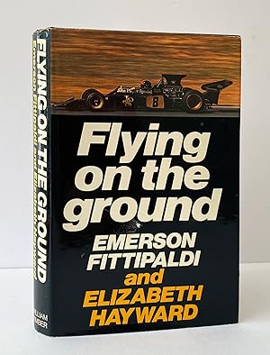 Flying on the Ground - SIGNED by Fittipaldi
