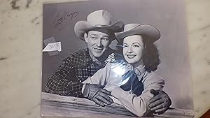 Bild des Verkufers fr Roy Rogers and Dale Evans B&W 8x10 Photo HEAD & SHOULDERS & ARMS SHOT WEARING COWBOY HATS, Authentic, hand-signed BY ROY ROGERS . King of the West 8"x10" photo Autographed by ROY ROGERS ONLY . pictured with his wife , includes lifetime certificate of authenticity (COA) from "5-Star Authenticated" zum Verkauf von Bluff Park Rare Books