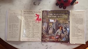 Seller image for WARNING ON THE WINDOW, JUDY BOLTON MYSTERY #20, 1ST EDITION & SIGNED BY AUTHOR MARGARET SUTTON, IN LATER COLOR DUSTJACKET OF 2 BEAUTIFUL GIRLS OUTSIDE HOUSE AT NITE, & WINDOW SILOUETTE OF BOWED MAN , 1949, WHEN OLD MR. PORTER IS REPORTED KILLED for sale by Bluff Park Rare Books